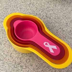 Breast cancer awareness measuring cups set of four.